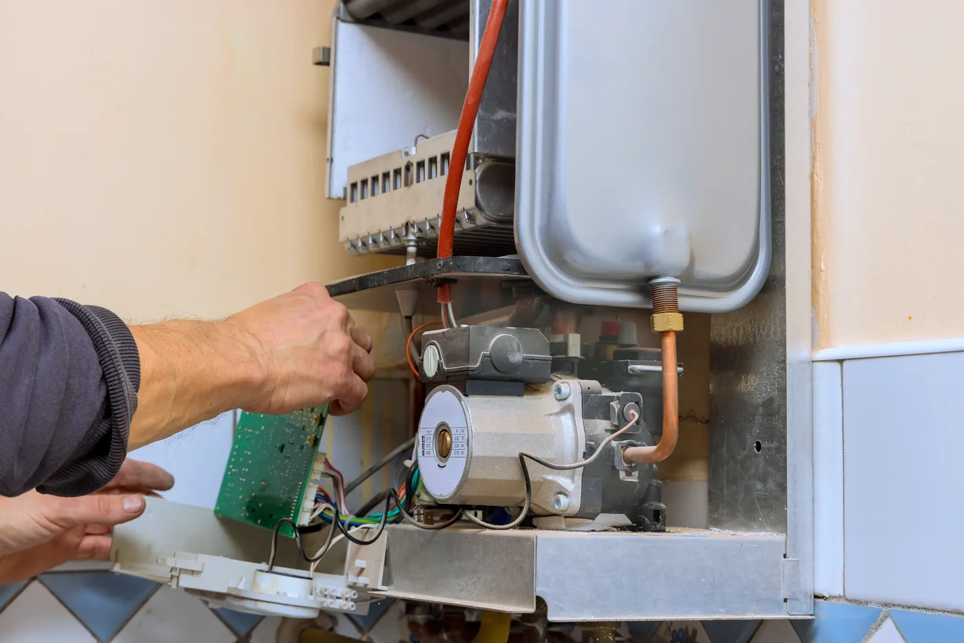 Servicing the burner assembly on a gas water heater